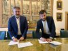 Firma della convenzione tra Comune di Ferrara e Hera per il progetto "Eco alberi" con - a destra - assessore Alessandro Balboni e - a sinsitra Cristian Fabbri di Hera Comm