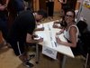 Banchetto di accoglienza del pubblico all'incontro di presentazione