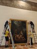 L'installazione della grande tela di Cignani nel salone del Plebiscito del Comune di Ferrara