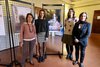 Da sinistra Paola Peruffo, l'ass. Dorota Kusiak e la dirigente Francesca Barbieri con la prof Federica Zabarri davanti alla mostra "Un'immagine per pensare" - Comune di Ferrara